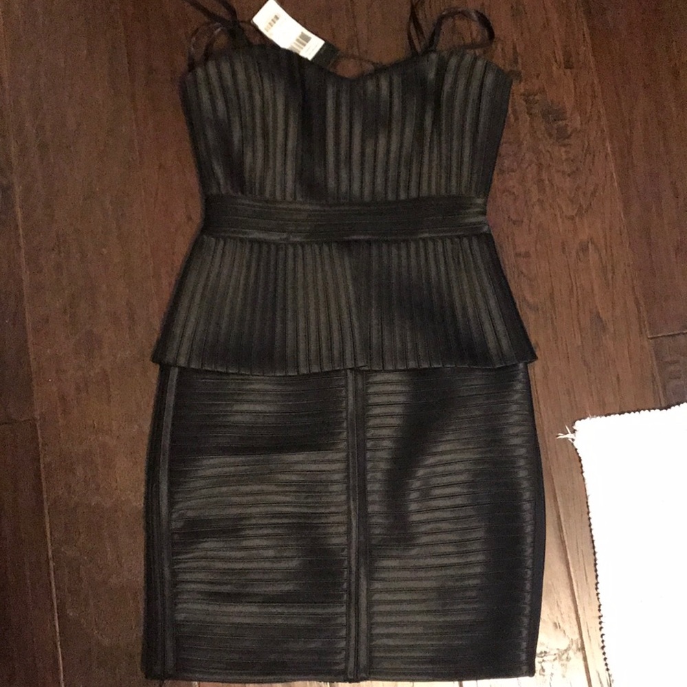 Never worn BCBG dress . Perfect for wedding!